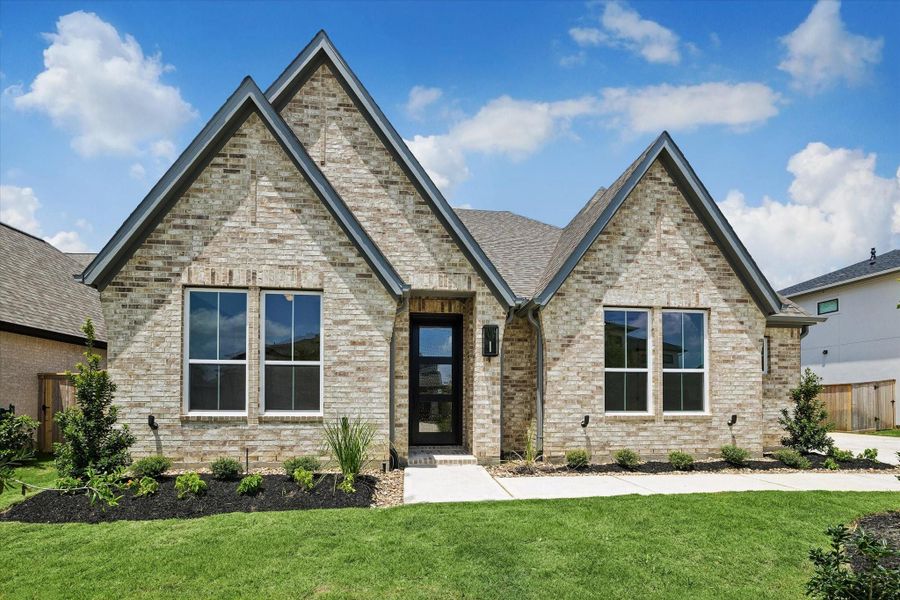 Welcome home to 422 Venado View Ct in the Grand Central Park community in Conroe, Texas