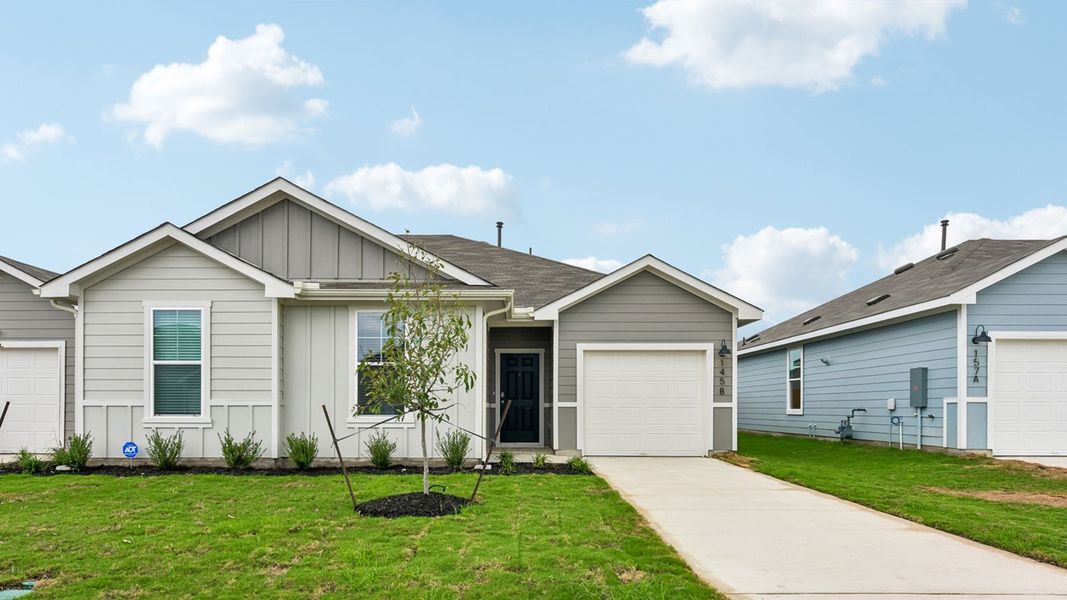 Front exterior of a new home in Wayside, Uhland, TX, highlighting curb appeal (Image 1). Front exterior of a new home in Wayside, Uhland, TX, highlighting curb appeal (Image 1).