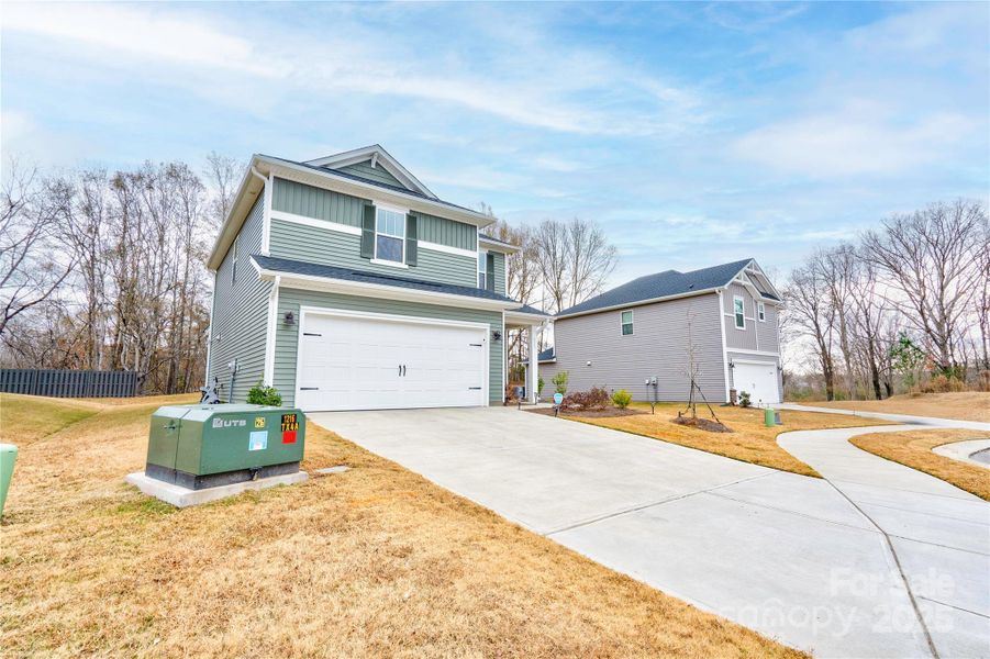 Front exterior of a new home in , Shelby, NC, highlighting curb appeal (Image 2).