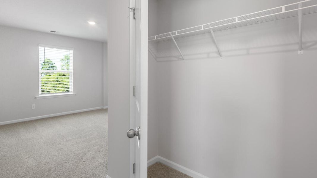 Spacious, unfurnished interior of a new home in Grayson Park Townhomes, Leland (Image 19). Spacious, unfurnished interior of a new home in Grayson Park Townhomes, Leland (Image 19).