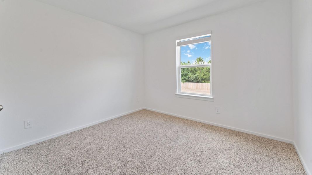 Spacious, unfurnished interior of a new home in Alaia Crossing, Houston (Image 10).