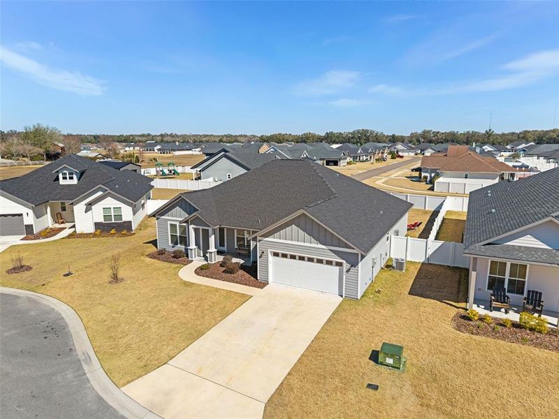 Front exterior of a new home in , Newberry, FL, highlighting curb appeal (Image 23).