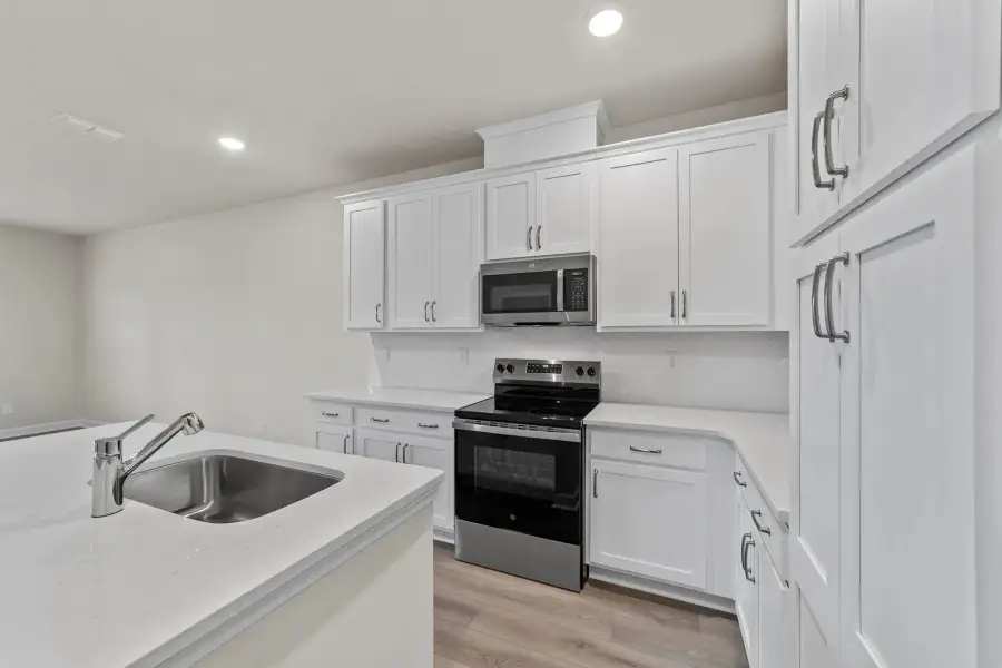 Sample Kitchen photo. Actual structural options and design finishes of home may vary.