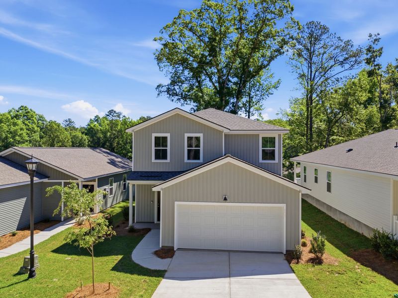 Front exterior of a new home in Grand Arbor, Blythewood, SC, highlighting curb appeal (Image 18). Front exterior of a new home in Grand Arbor, Blythewood, SC, highlighting curb appeal (Image 18).