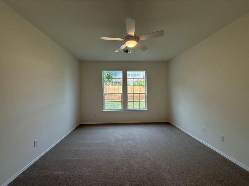 Spacious, unfurnished interior of a new home in River Bluff, Leander (Image 13).