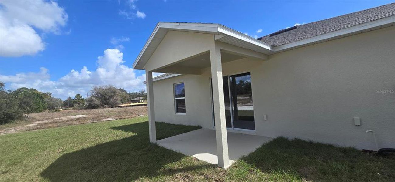 Exterior details and patio area of a home in Poinciana, Poinciana (Image 3).