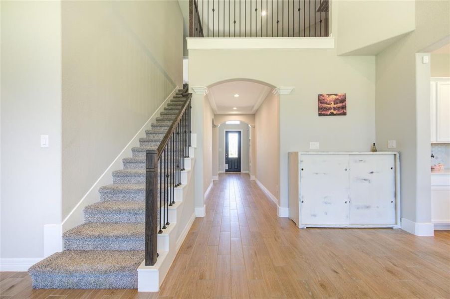 Inviting entrance hall with a warm and inviting atmosphere, perfect for making a lasting first impression