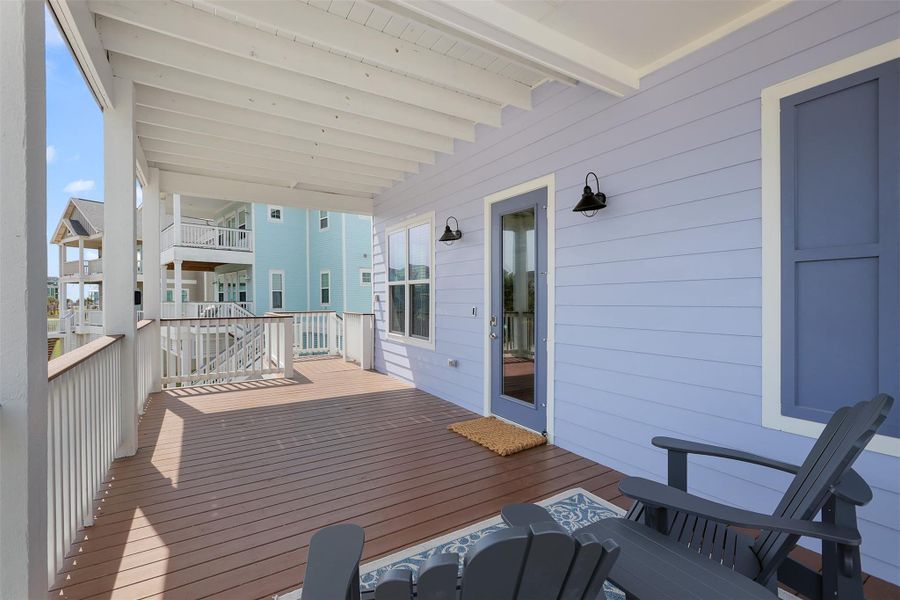 This wide covered balcony is the perfect place to sip your morning coffee, enjoy the sound of the waves, or unwind in the evening after a sun-filled beach day.