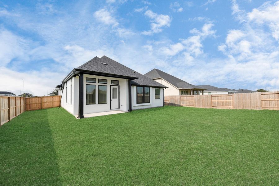 Exterior details and patio area of a home in Arabella on the Prairie: Premier Collection, Richmond (Image 15). Exterior details and patio area of a home in Arabella on the Prairie: Premier Collection, Richmond (Image 15).