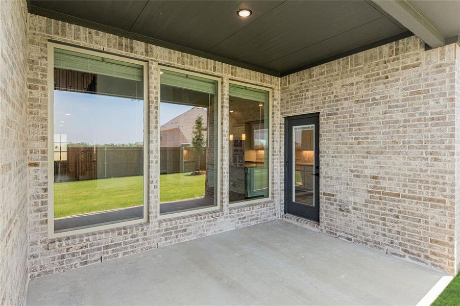 Exterior details and patio area of a home in Chaparral Park, Oak Point (Image 3). Exterior details and patio area of a home in Chaparral Park, Oak Point (Image 3).