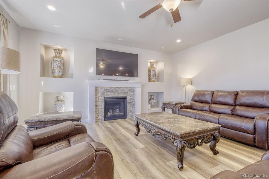 main level living room with fireplace