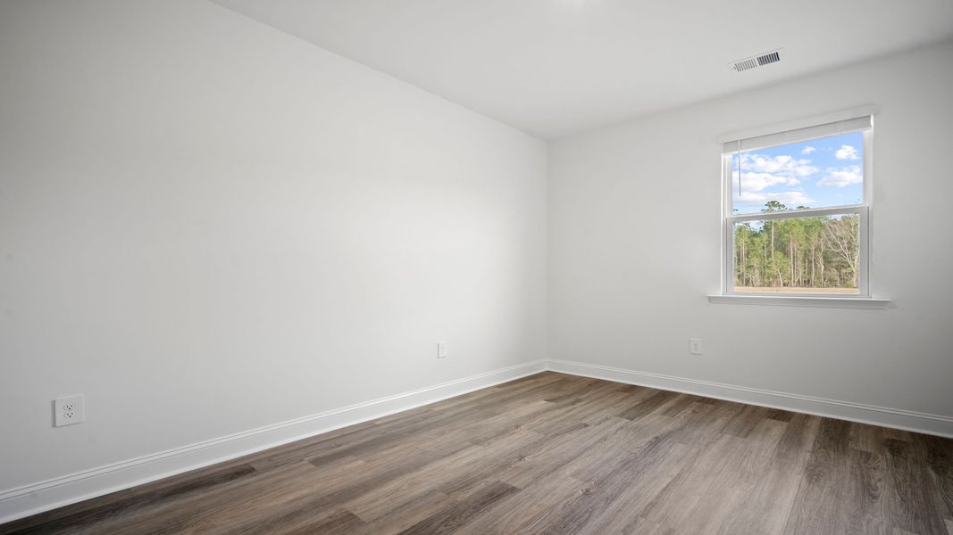 Representative unfurnished interior of a home built from the Hemingway-Exp by D.R. Horton in The Lakes at North Glynn, Brunswick (Image 27).