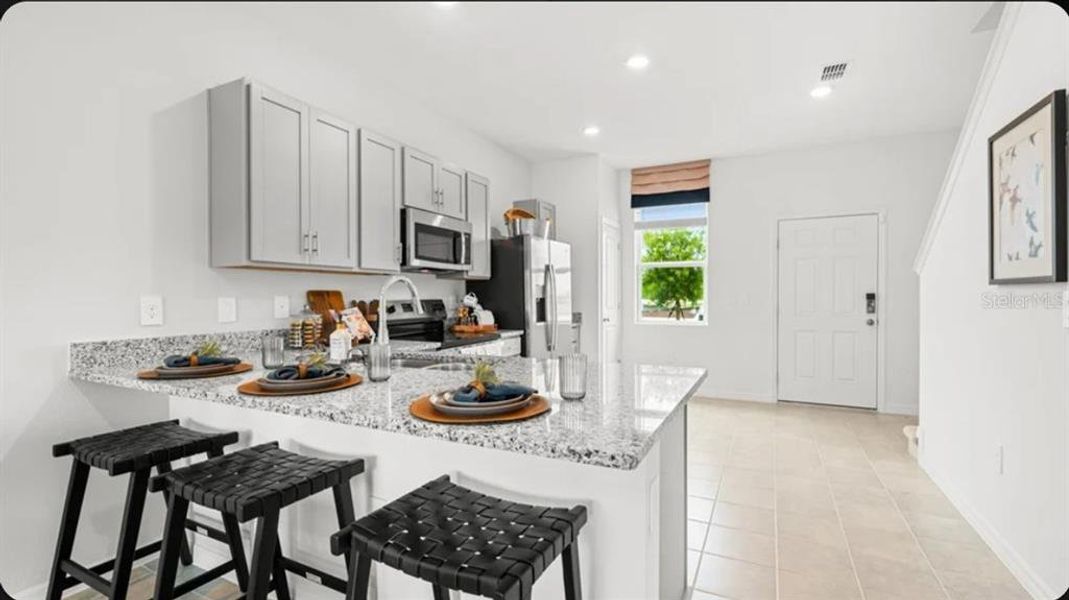 Furnished interior view inside a new home in Southloch, Mount Dora (Image 11).