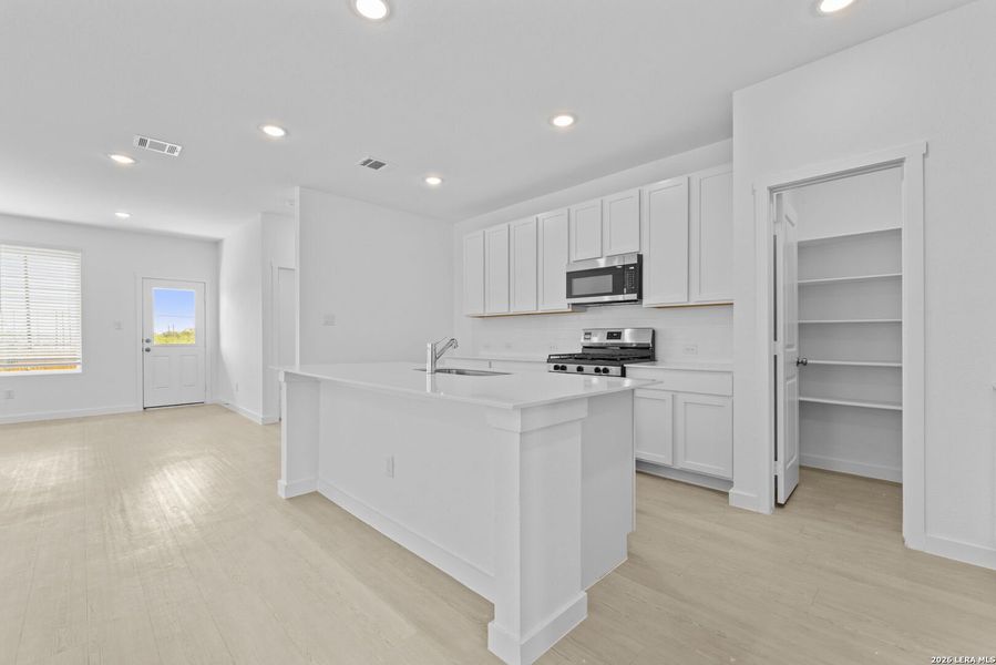 Furnished interior view inside a new home in Espada, San Antonio (Image 10).