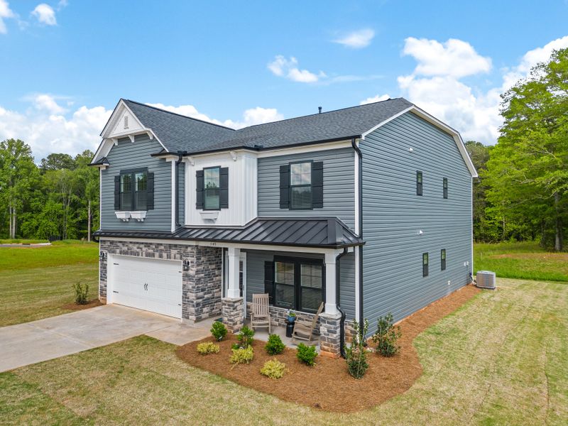 Representative exterior photo of a completed home built from the Brantley II by Great Southern Homes in Collins Cove, Chapin, SC (Image 23).