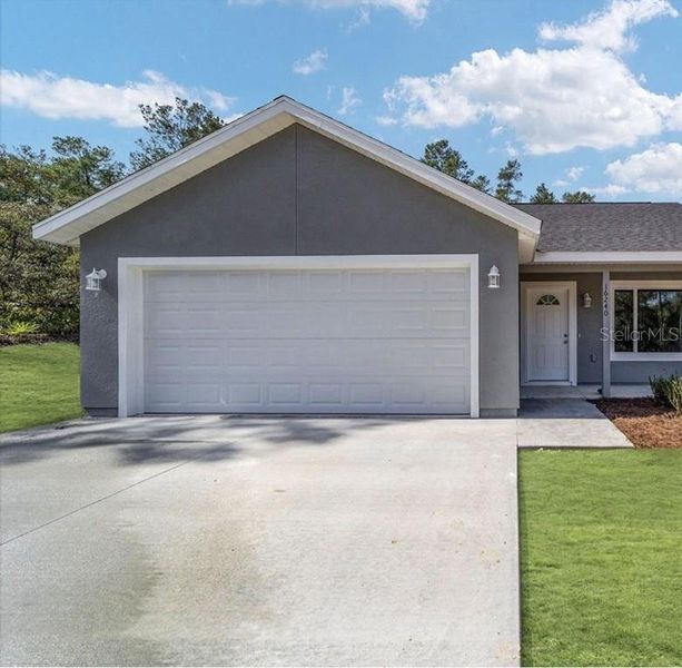 Front exterior of a new home in , Williston, FL, highlighting curb appeal (Image 1). Front exterior of a new home in , Williston, FL, highlighting curb appeal (Image 1).