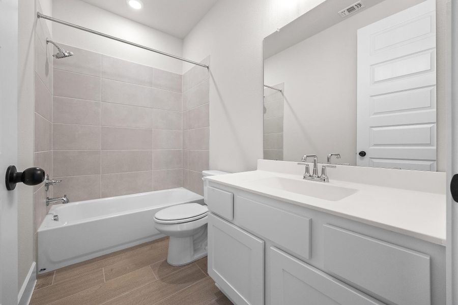 Furnished interior view inside a new home in Parmer Ranch, Georgetown (Image 11).