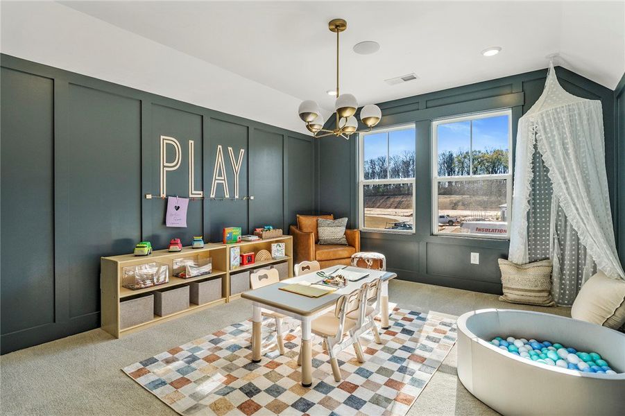 This vibrant play area features ample natural ligh