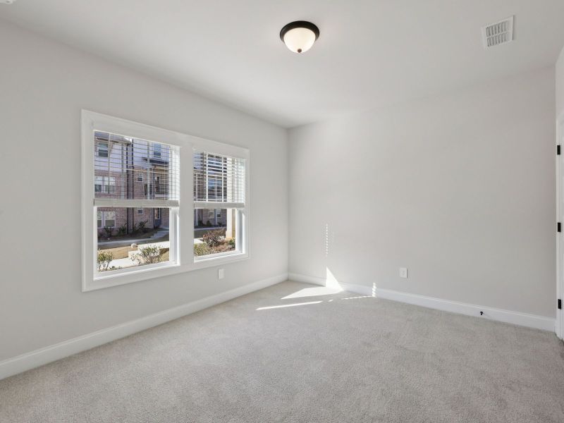 Spacious, unfurnished interior of a new home in Hemingway - Highland Series, Cumming (Image 19).
