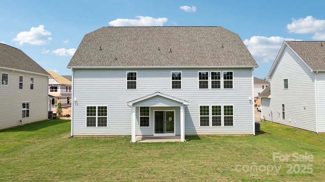 Front exterior of a new home in Sylvan Creek, Denver, NC, highlighting curb appeal (Image 1).