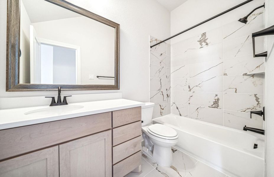 Furnished interior view inside a new home in Bridgeland 60′, Cypress (Image 16).