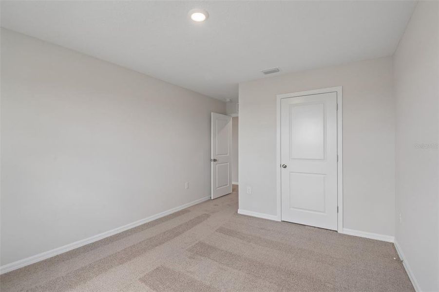 Spacious, unfurnished interior of a new home in Pasadena Ridge, Dade City (Image 14).
