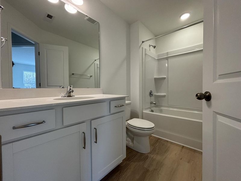 Furnished interior view inside a new home in CraigStone, Woodruff (Image 6).