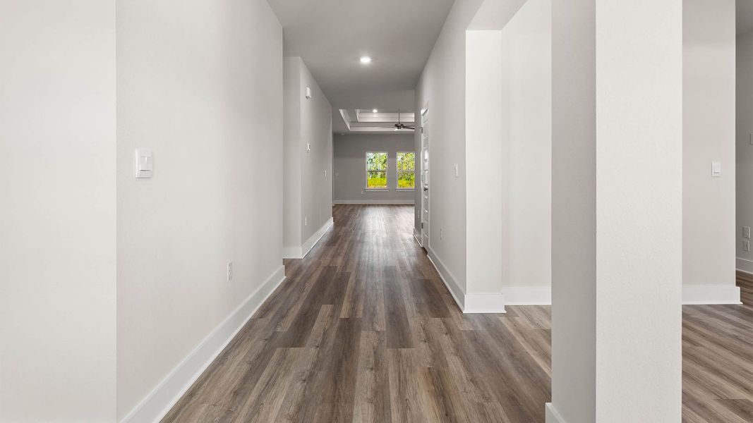 Representative unfurnished interior of a home built from the The Mckenzie by D.R. Horton in Liberty, Panama City (Image 14).