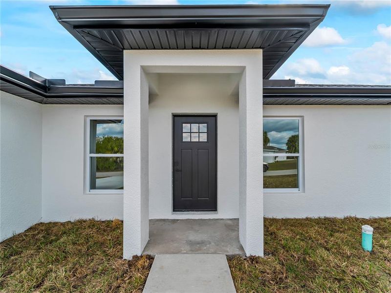 Exterior details and patio area of a home in , Port Charlotte (Image 33).