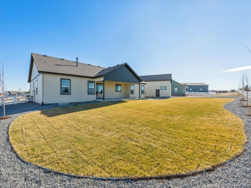 Exterior details and patio area of a home in , Dacono (Image 27).