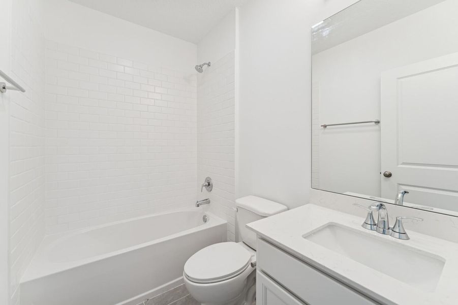 Furnished interior view inside a new home in Aspire at Port St. Lucie, Port St. Lucie (Image 9).