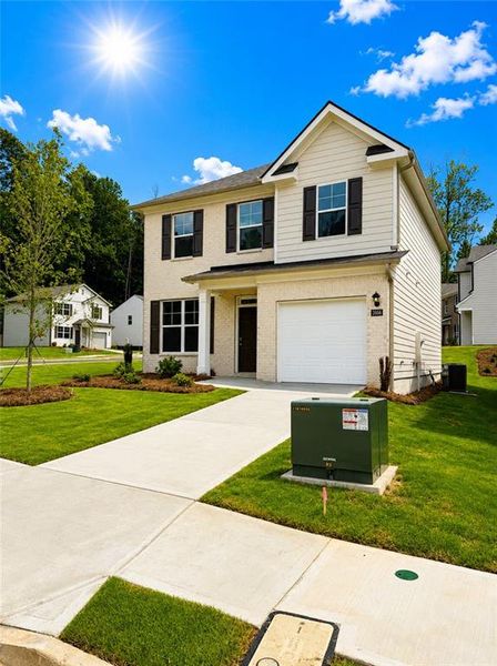 Front exterior of a new home in Sherwood Manor, College Park, GA, highlighting curb appeal (Image 18). Front exterior of a new home in Sherwood Manor, College Park, GA, highlighting curb appeal (Image 18).