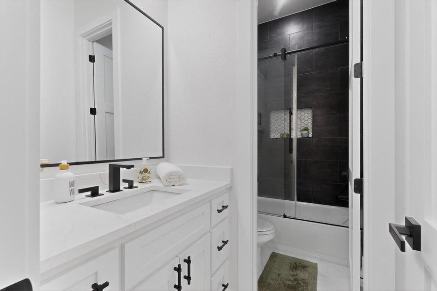 Hall Bathroom #3 with a shower stall and toilet Hall Bathroom #3 with a shower stall and toilet