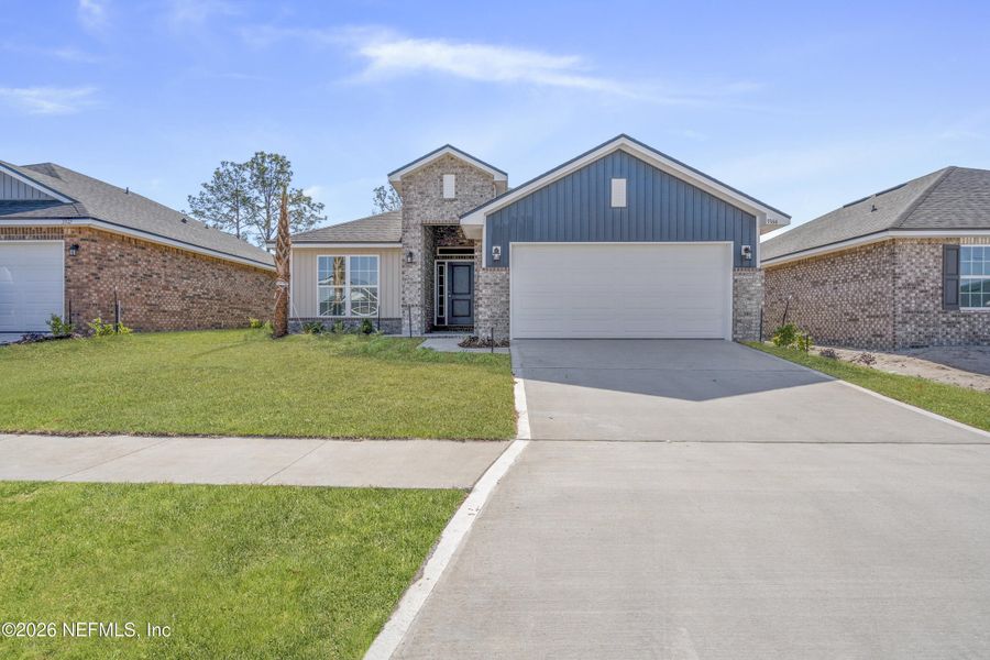 Front exterior of a new home in , Green Cove Springs, FL, highlighting curb appeal (Image 18).