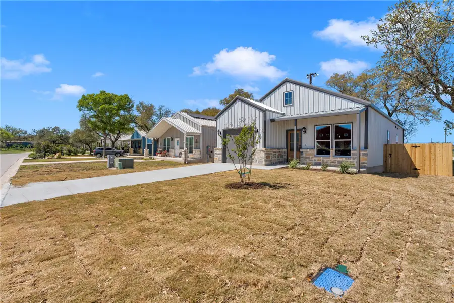 Front exterior of a new home in , Bertram, TX, highlighting curb appeal (Image 2). Front exterior of a new home in , Bertram, TX, highlighting curb appeal (Image 2).