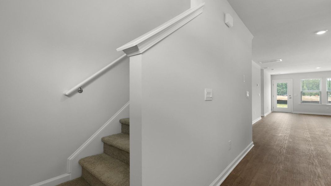 Spacious, unfurnished interior of a new home in Pine Hills Townhomes at Cane Bay, Summerville (Image 19).