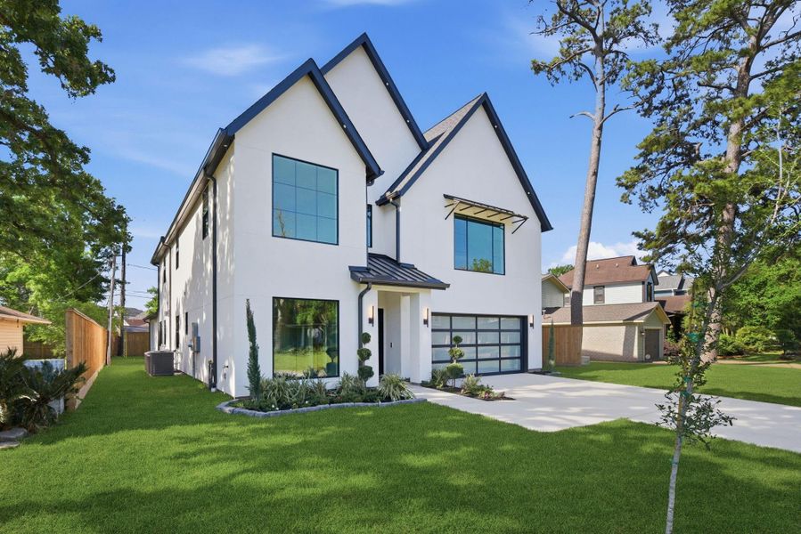 Front exterior of a new home in , Houston, TX, highlighting curb appeal (Image 26).