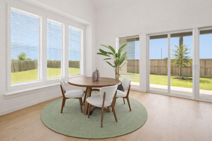 Make memories gathered around the table with your family and friends! Featuring natural bright light, large windows, professionally installed blinds throughout, high ceilings, beautiful flooring and access to the covered back patio!