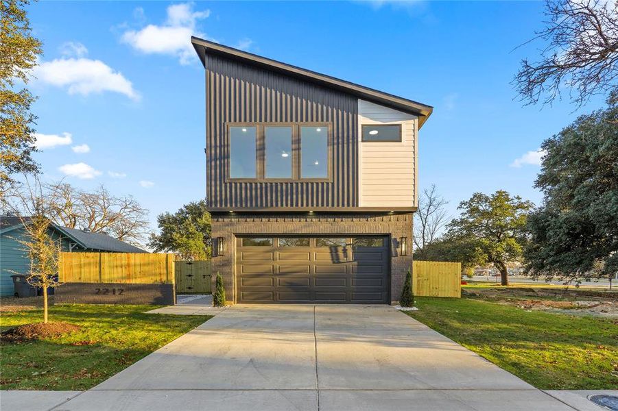 Front exterior of a new home in , Dallas, TX, highlighting curb appeal (Image 20).