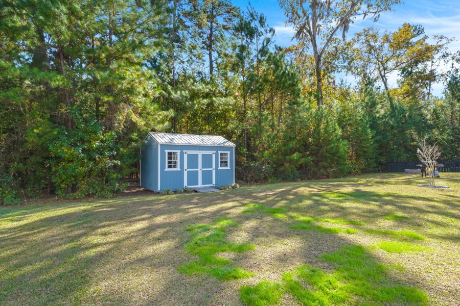 Exterior details and patio area of a home in The Ponds, Summerville (Image 27). Exterior details and patio area of a home in The Ponds, Summerville (Image 27).