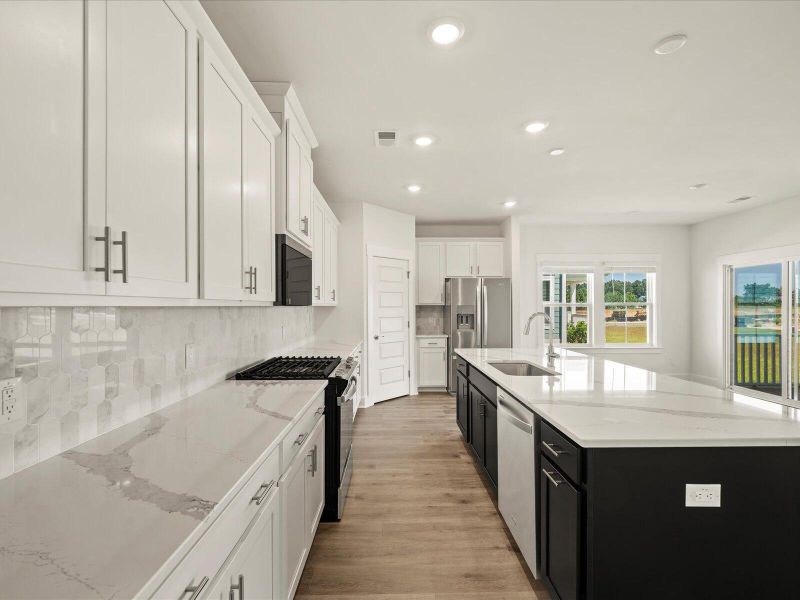 Furnished interior view inside a new home in The Coves at Lakes of Cane Bay, Summerville (Image 5).
