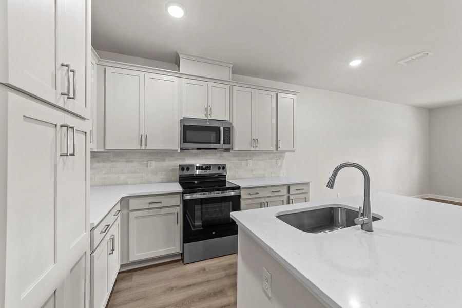 Furnished interior view inside a new home in Blue Heron Retreat, Little River (Image 6).