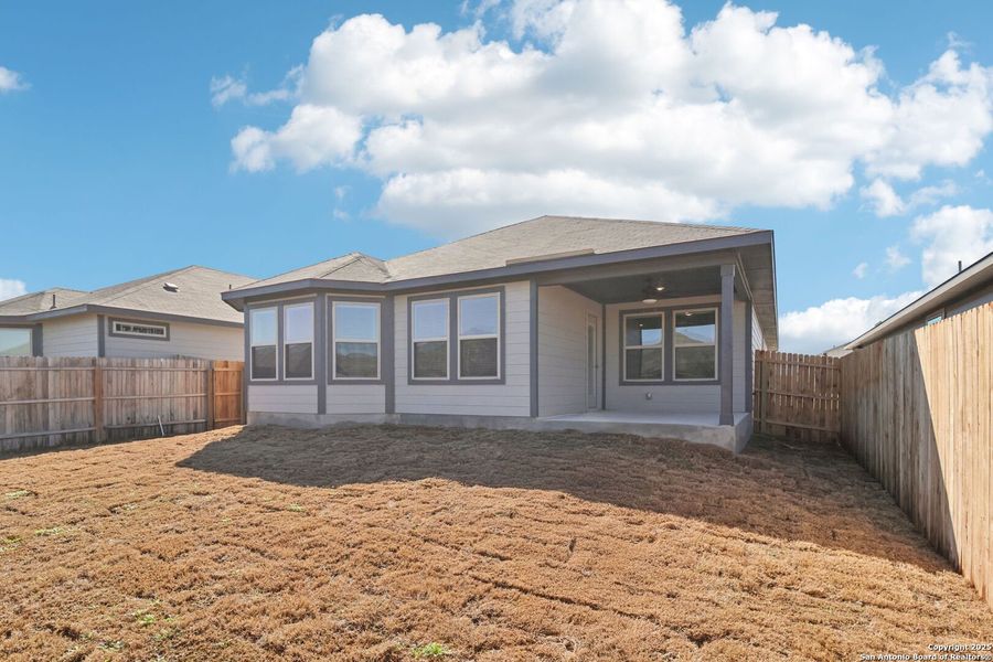 Exterior details and patio area of a home in Catalina, Converse (Image 23).