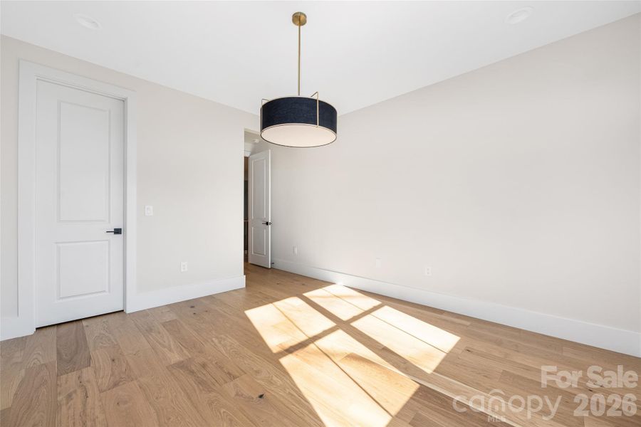 Upper-level guest bedroom 2.