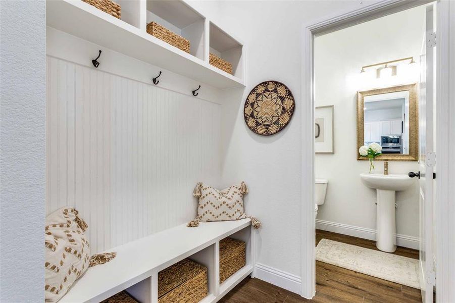 Mudroom with dark hardwood / wood-style floors