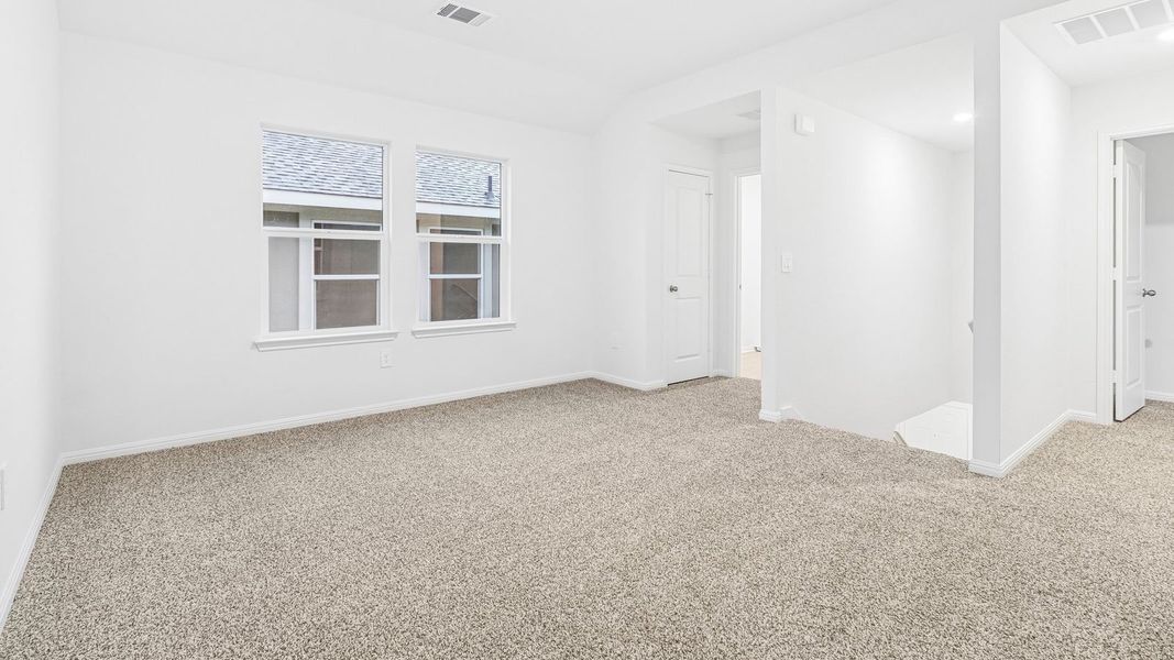 Spacious, unfurnished interior of a new home in Bar W Ranch, Leander (Image 26).