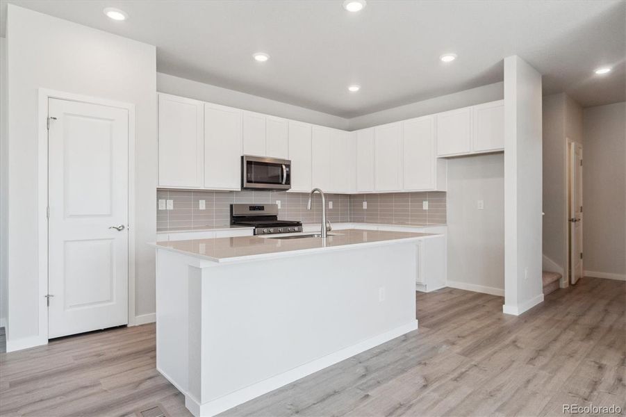 Furnished interior view inside a new home in Paired Homes at Alder Creek, Parker (Image 7).