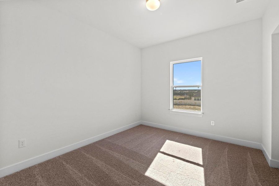 Spacious, unfurnished interior of a new home in Lariat, Liberty Hill (Image 38).