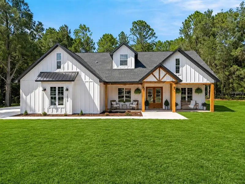 Front exterior of a new home in , Ocala, FL, highlighting curb appeal (Image 24). Front exterior of a new home in , Ocala, FL, highlighting curb appeal (Image 24).