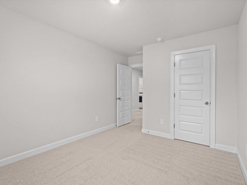 Spacious, unfurnished interior of a new home in Crossing at Abner Creek Townes, Greer (Image 18).